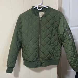 This jacket is from Faded Glory, it is a hunter green color
